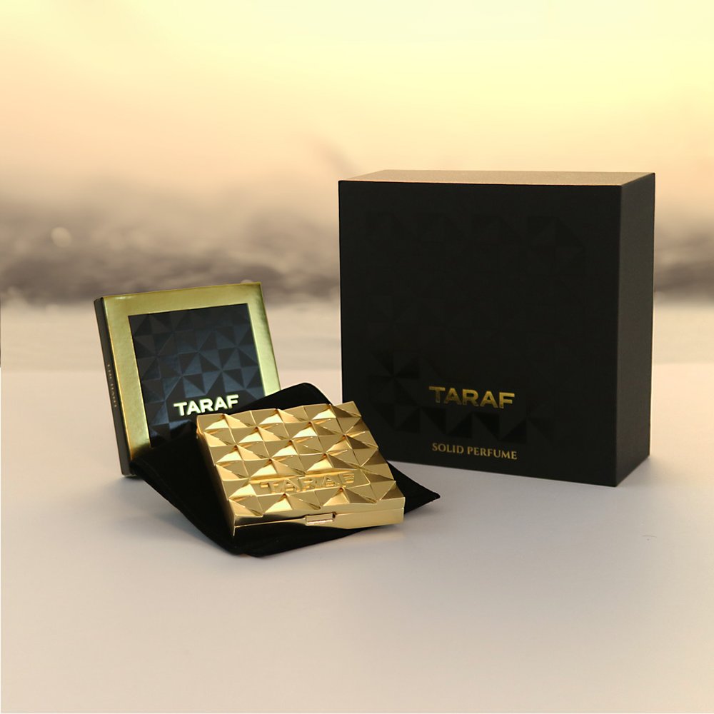 TARAF ENCHANT SOLID PERFUME gold compact with black velvet pouch and black gift box