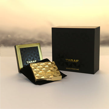 TARAF ENCHANT SOLID PERFUME gold compact with black velvet pouch and black gift box