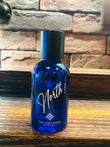 NORTH perfume by THE CODE VOYAGE in a blue bottle with a sleek design and black cap