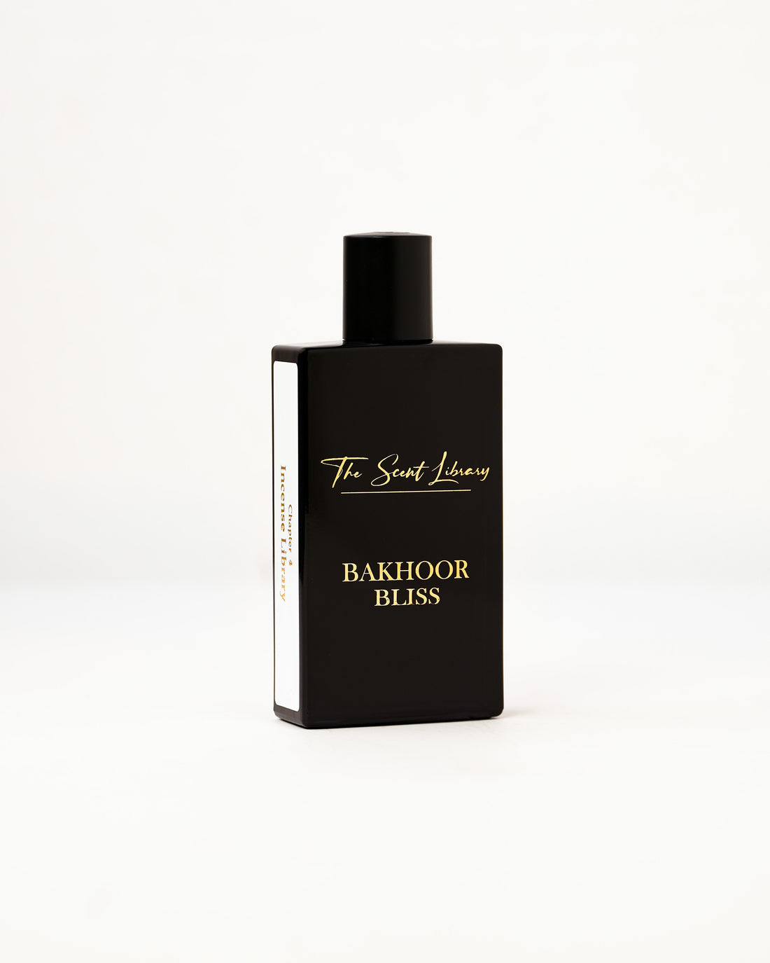 Bakhoor Bliss eau de parfum by The Scent Library, a glossy black rectangular bottle with gold lettering and a Chapter 4 Incense Library side label