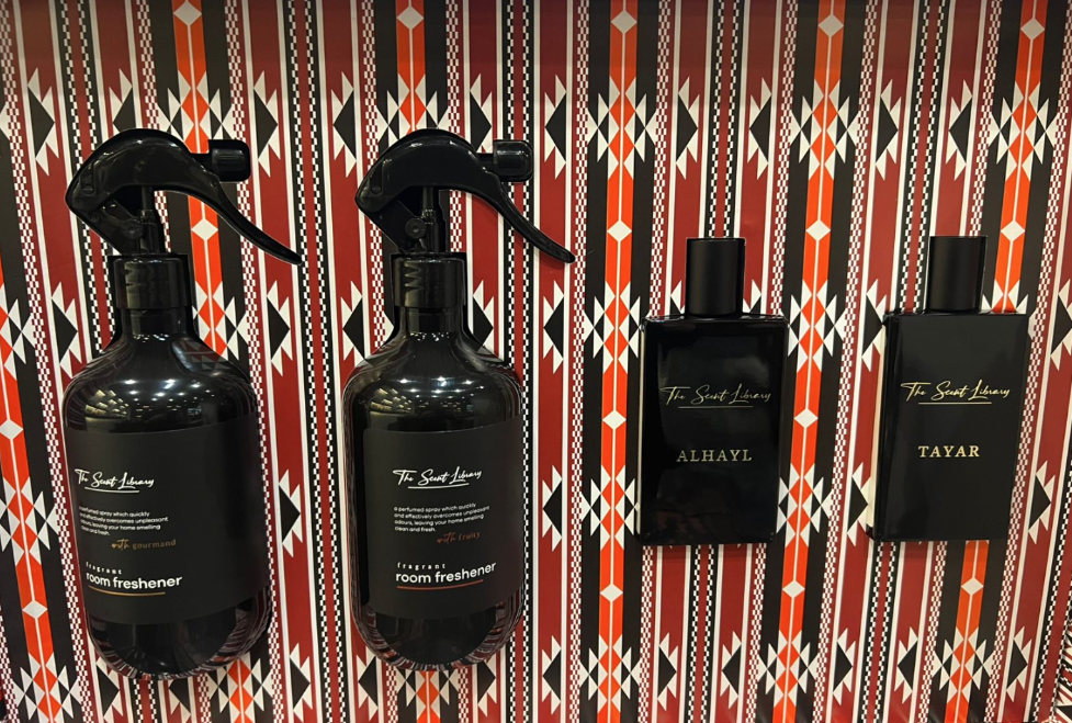 The Royal Collection by Baytak, two amber room freshener sprays and two black perfumes in a red Sadu-patterned gift box, by The Scent Library