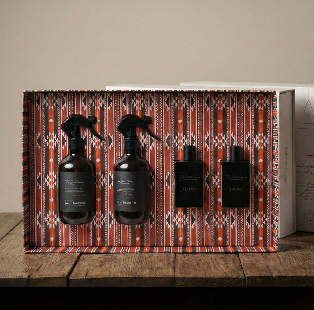 The Royal Collection by Baytak, two amber room freshener sprays and two black perfumes in a red Sadu-patterned gift box, by The Scent Library