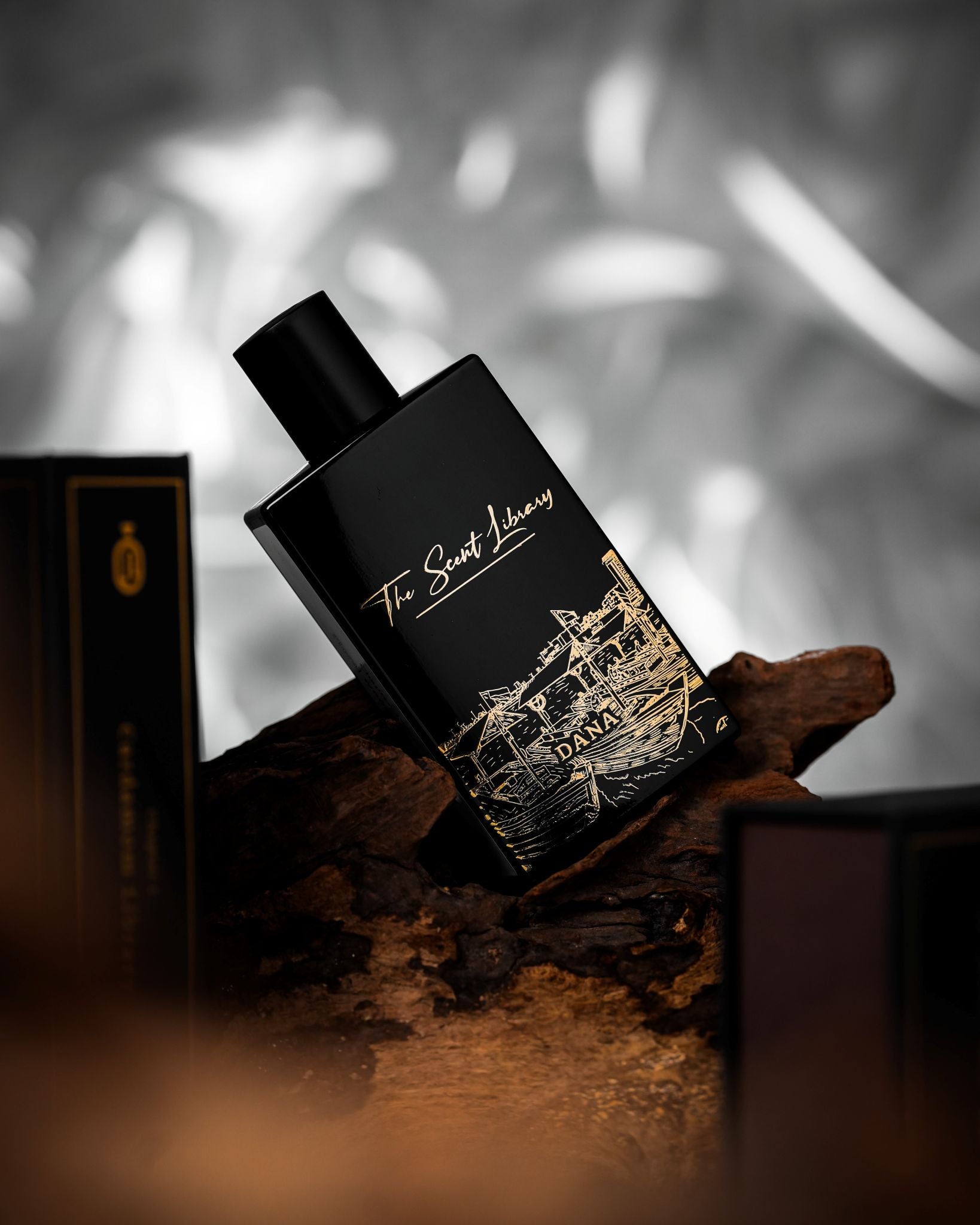 Dana Collector's Edition by Kevin Mathys at The Scent Library, a black bottle with gold harbour artwork, alternate view
