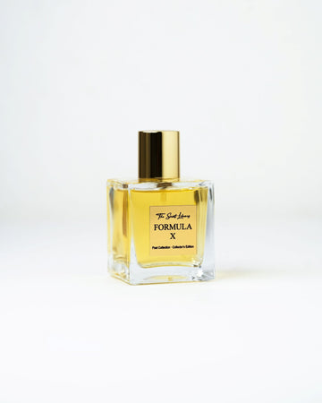 Formula X eau de parfum by The Scent Library, a clear square glass bottle with a gold cap and amber fragrance, Past Collection Collector's Edition