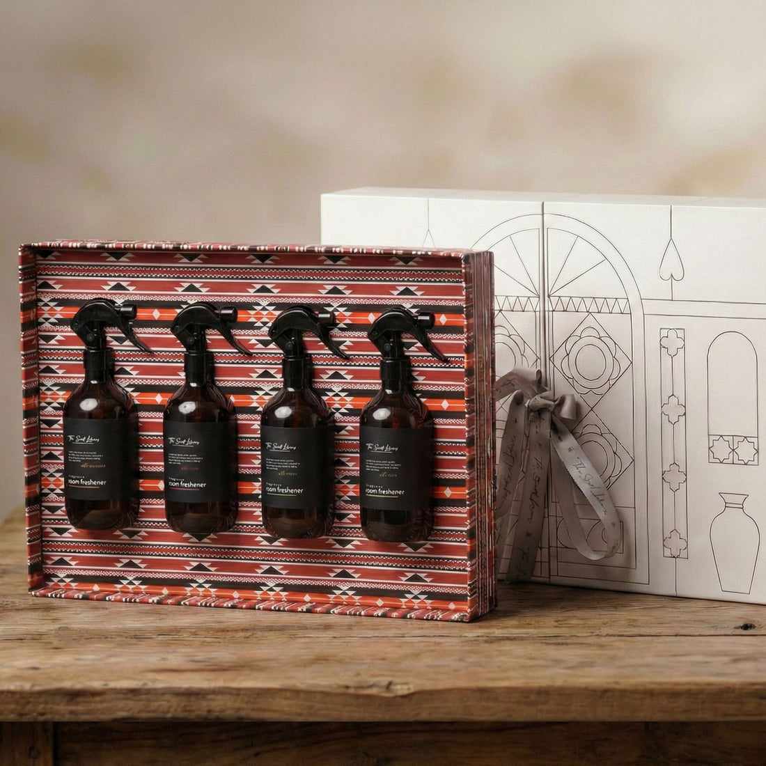 The Scent Library Gift Box with four 100ml spray bottles featuring home fragrance suggestions