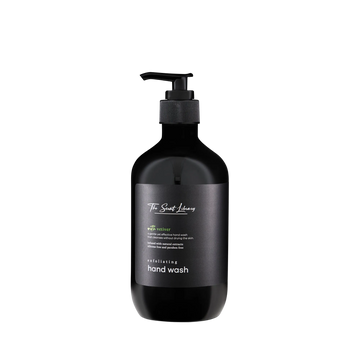 Vetiver woods exfoliating hand wash by The Scent Library in a black pump bottle with a gold label