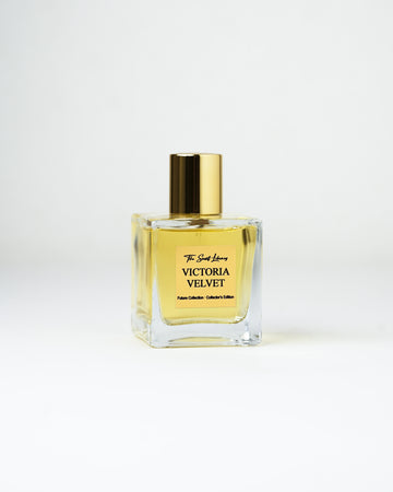 Victoria Velvet eau de parfum by The Scent Library, a clear square glass bottle with a gold cap and amber fragrance, Past Collection