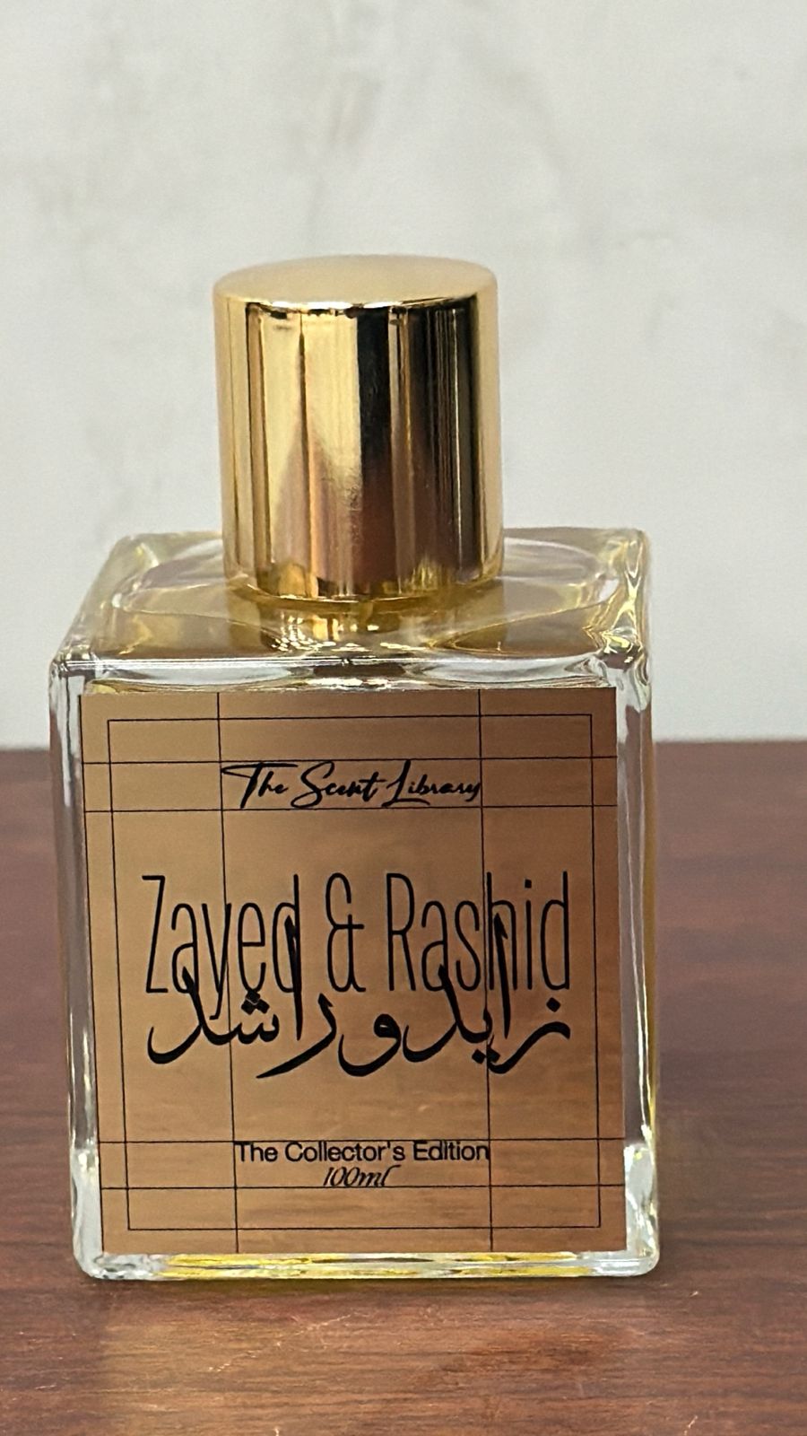 Zayed & Rashid perfume in a clear bottle with a gold cap, part of The Scent Library's Collector's Edition