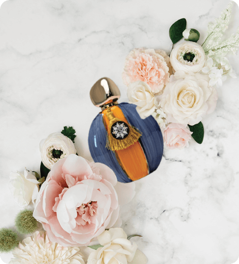 Soul of Mine perfume bottle with gold cap and tassel featuring TREASURE exclusive scent