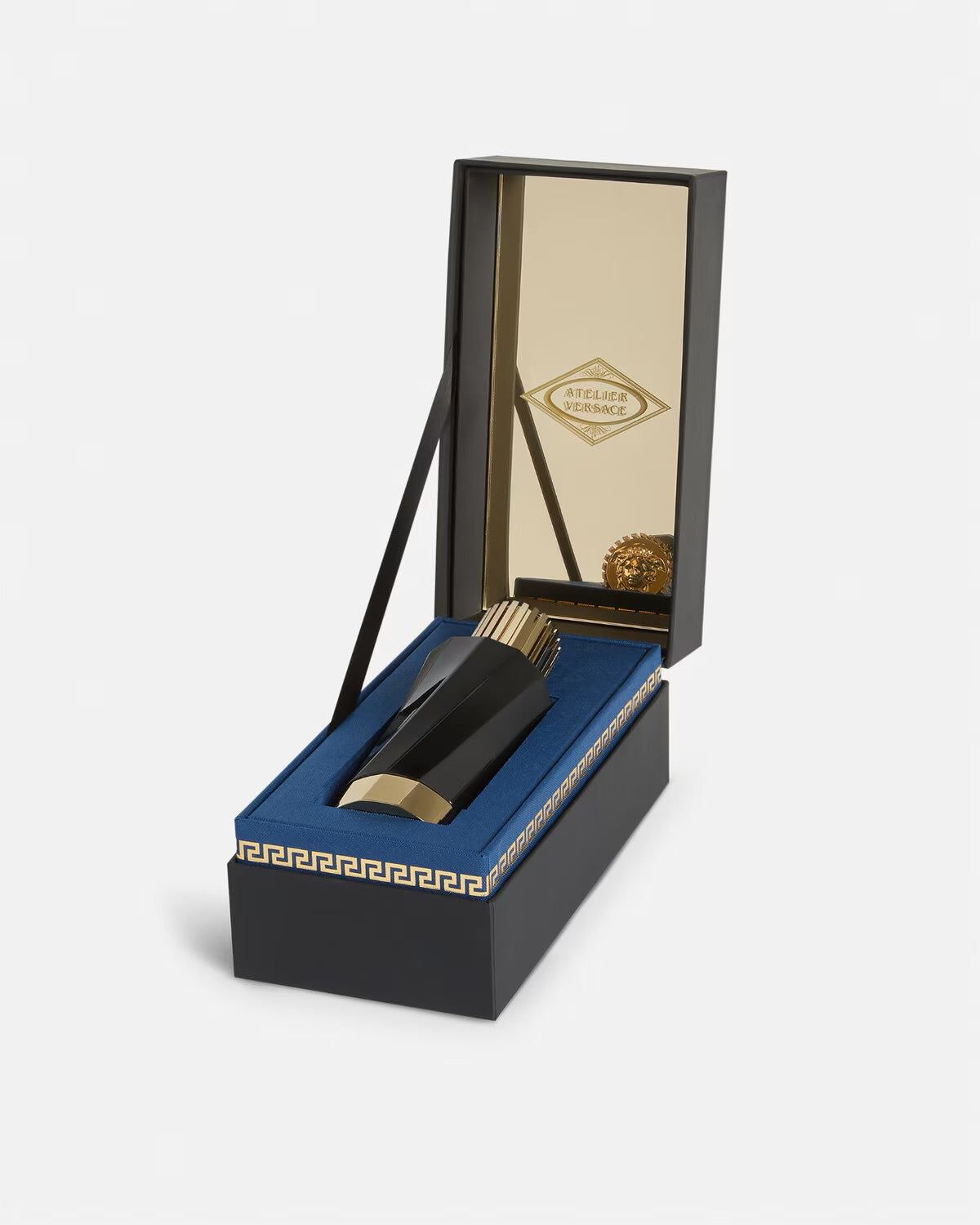 Versace Vanille Rouge perfume bottle in a luxurious black and gold box with blue velvet interior