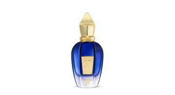 Xerjoff Torino 21 perfume bottle in deep blue with gold cap and label on black background